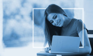 Woman writing in journal