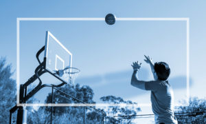 Dean Graziosi playing basketball