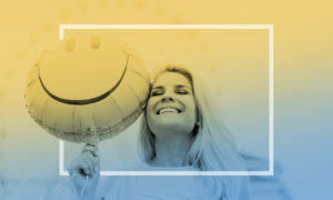 woman with smiling balloon