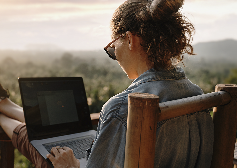 woman working on computer outside