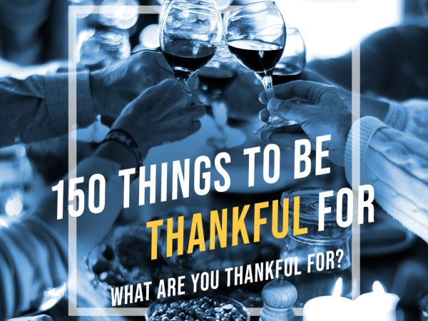 150 Things To Be Thankful For - Thanksgiving table toasting wine